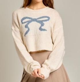 Cream and beige specks with blue bow sweater