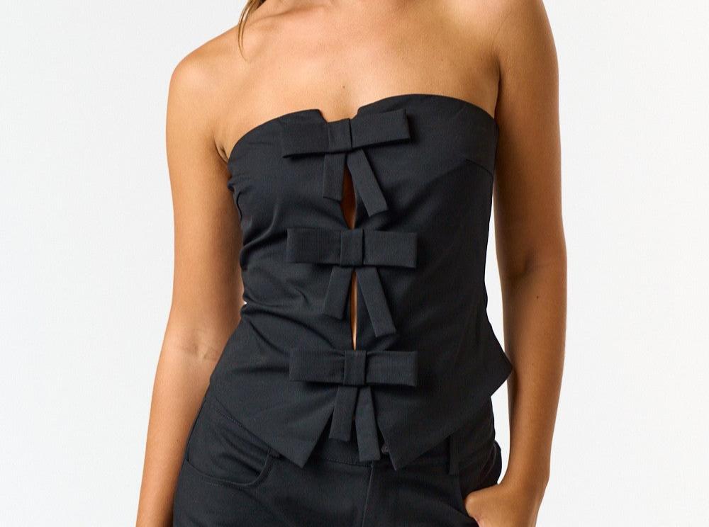 Strapless top with 3 bow closures