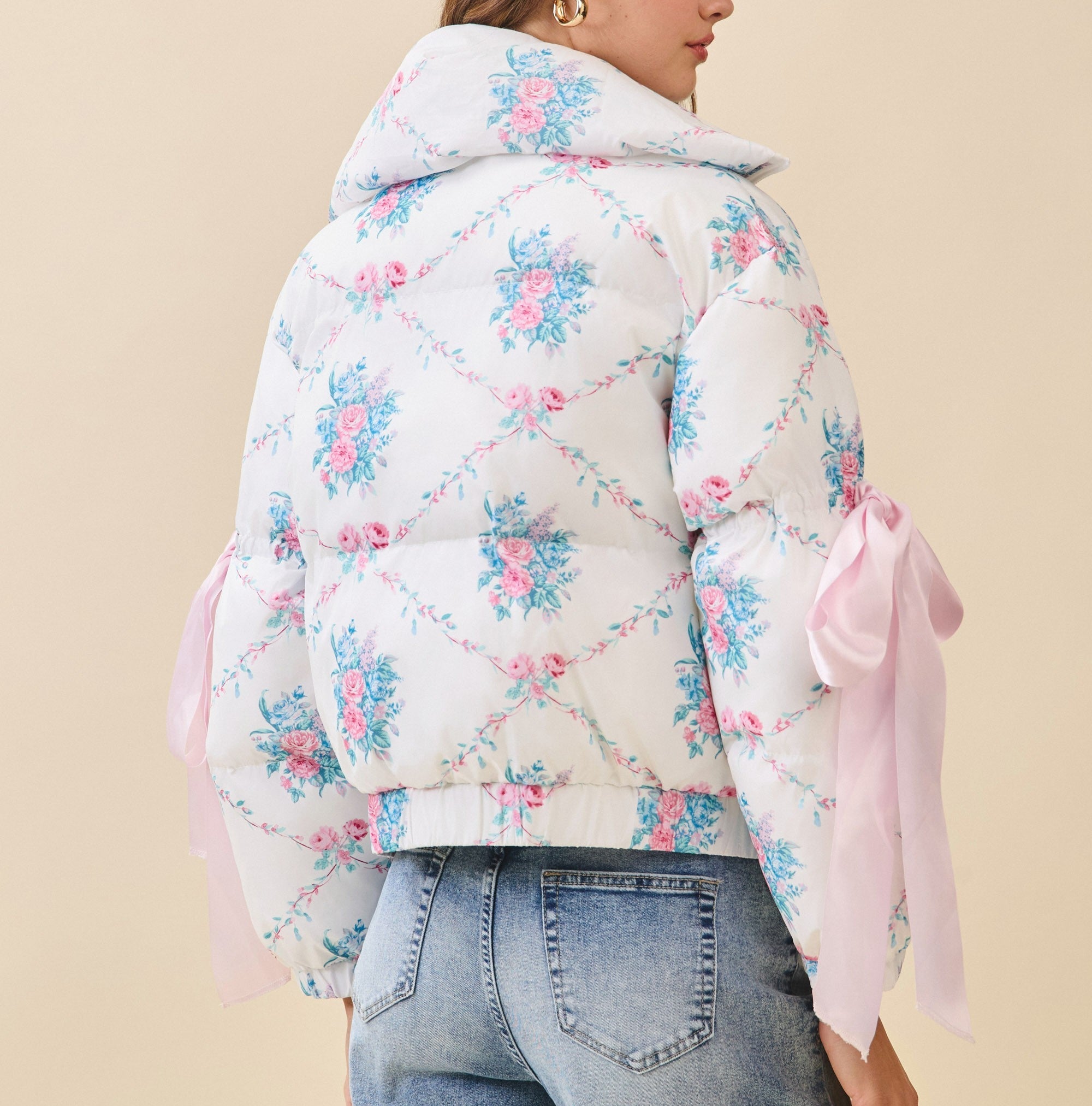 White with color floral and big bows on sleeves