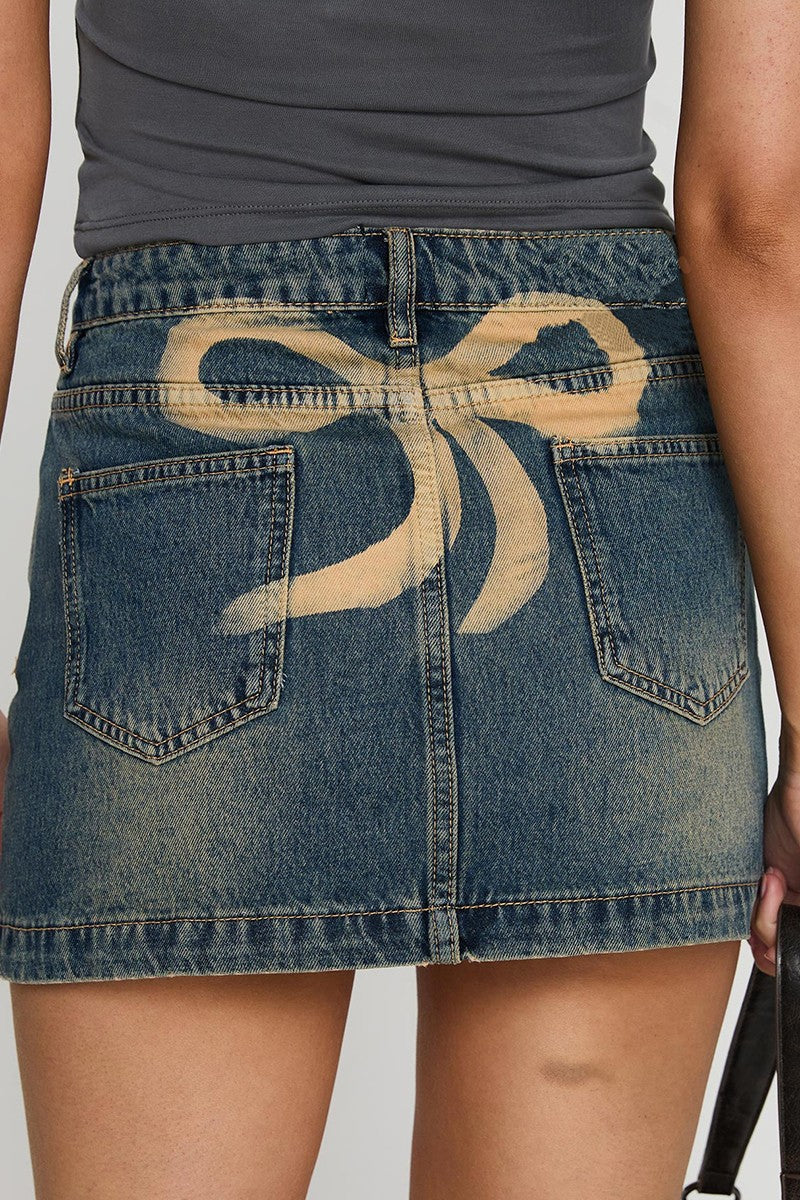 Bow painted on back denim mini skirt