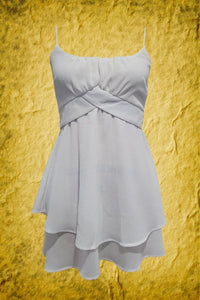 white crape tie back dress with spaghetti straps