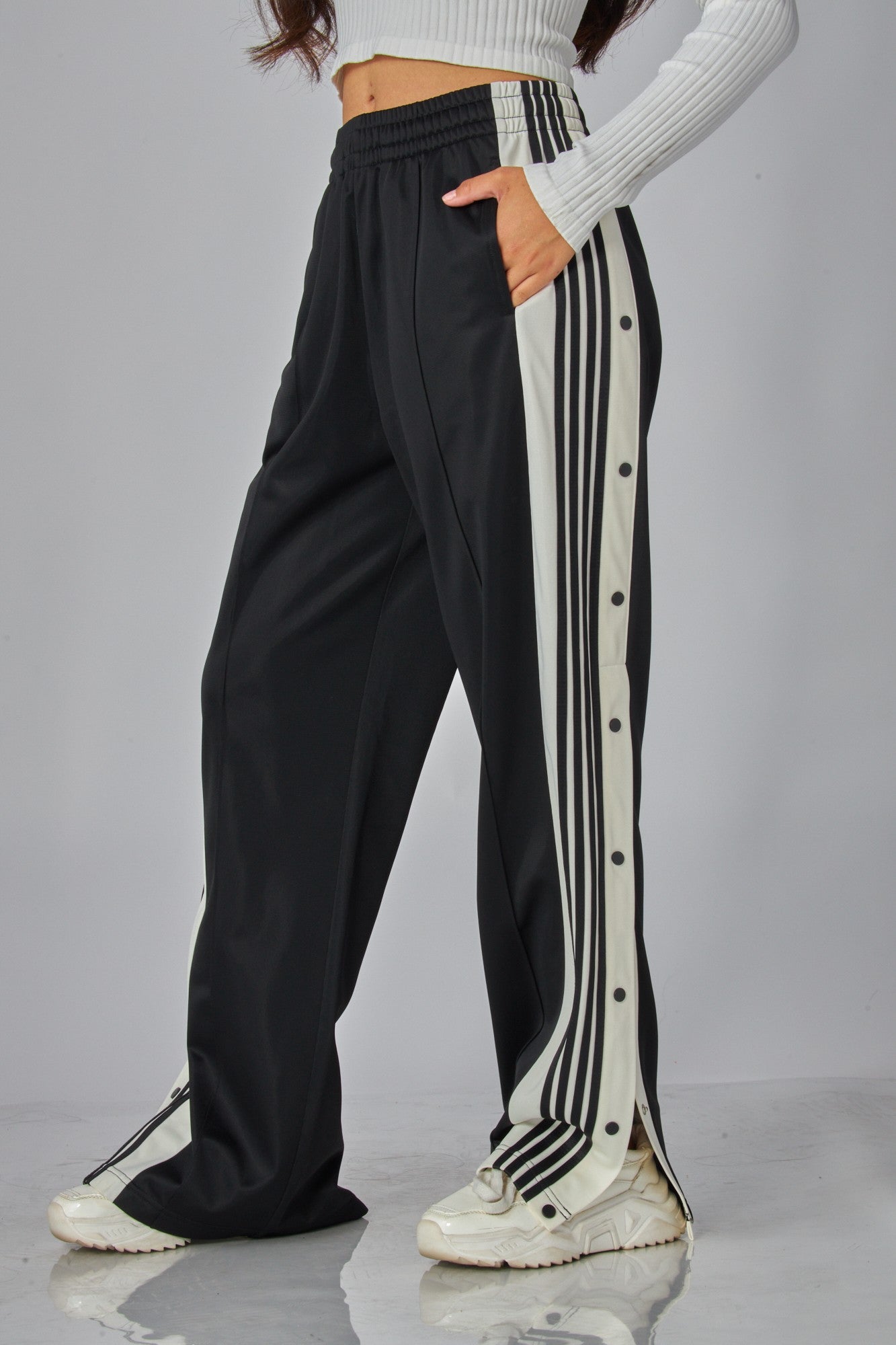 Snap away track pants with stripes