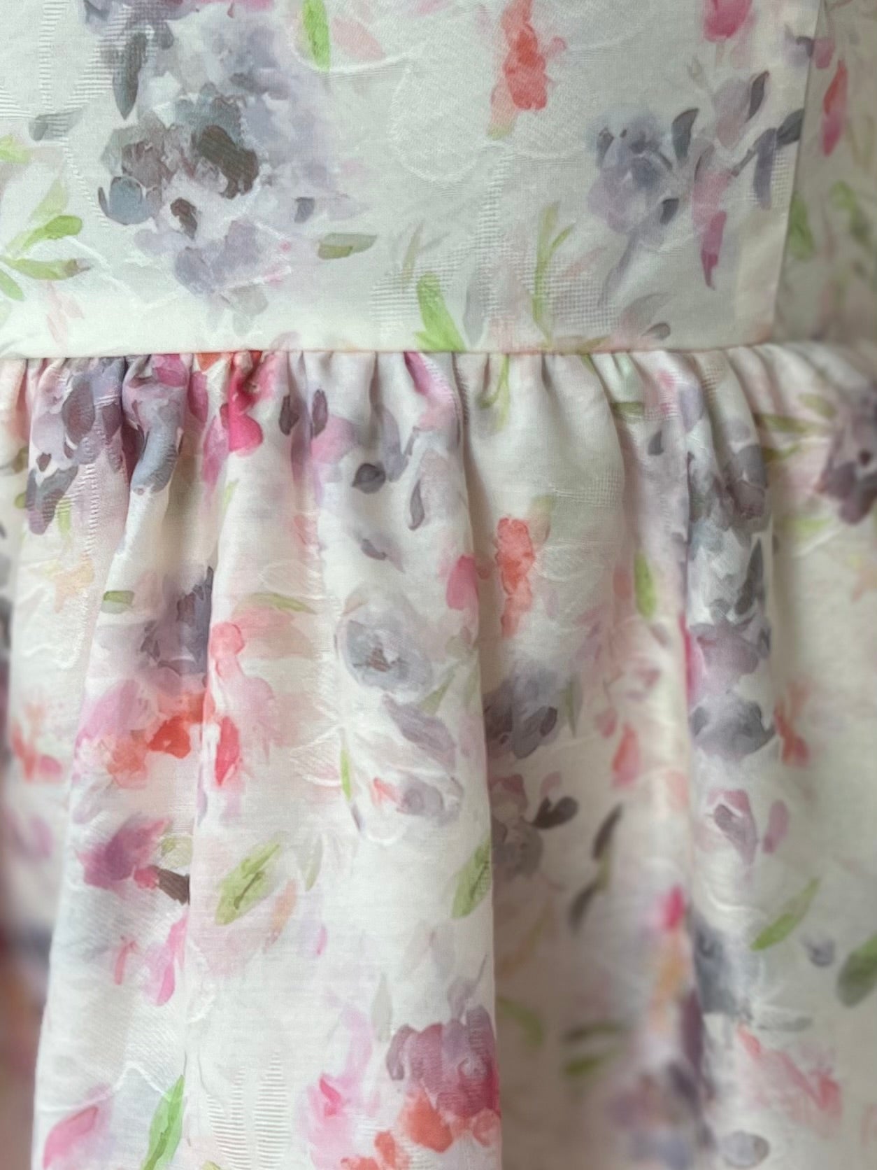 Spaghetti strap ivory textured floral ruffle bottom dress