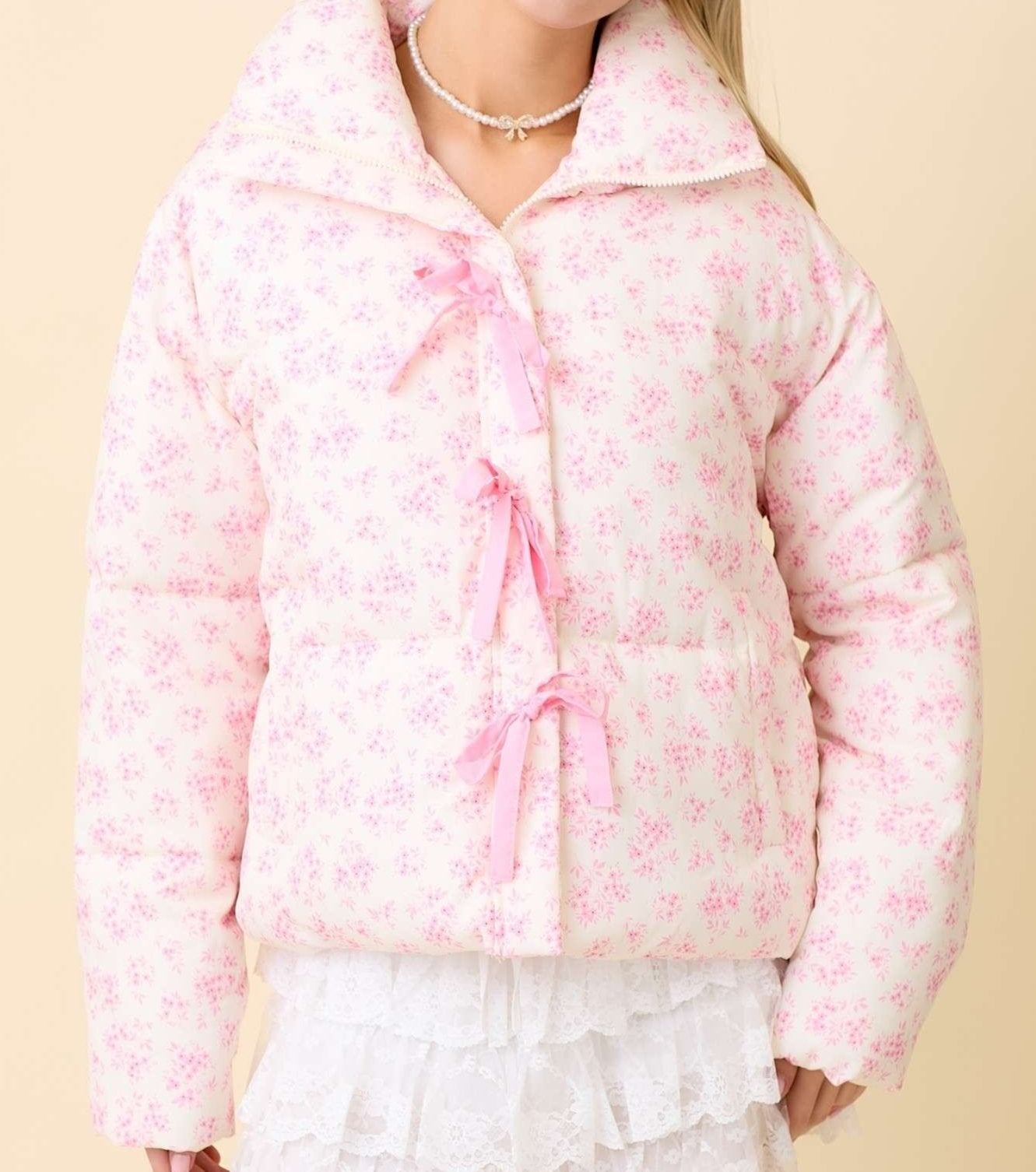 Floral puffer jacket with bows