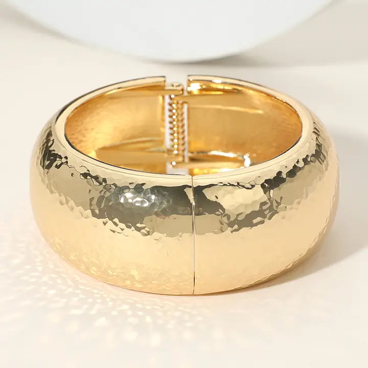 Chunky hammered metal hinged bangle