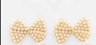 Small Bow studs with encrusted small pearls