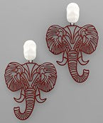 Thin filigree elephant with white rock