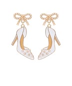 white metal heels with pearls and bow