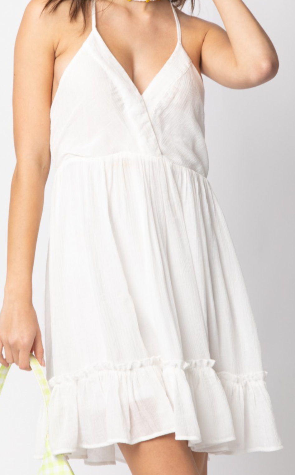 Lattice style open back ruffle mini dress