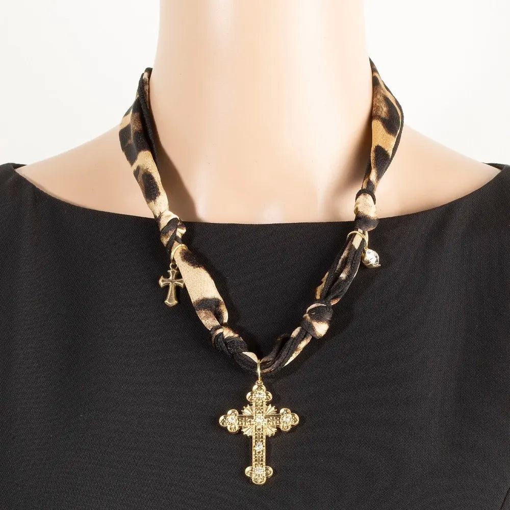 Big cross pendant and charms on leopard scarf necklace
