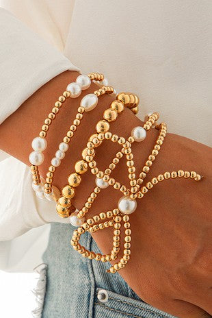 Bow knot pearl beaded multi layered bracelet set