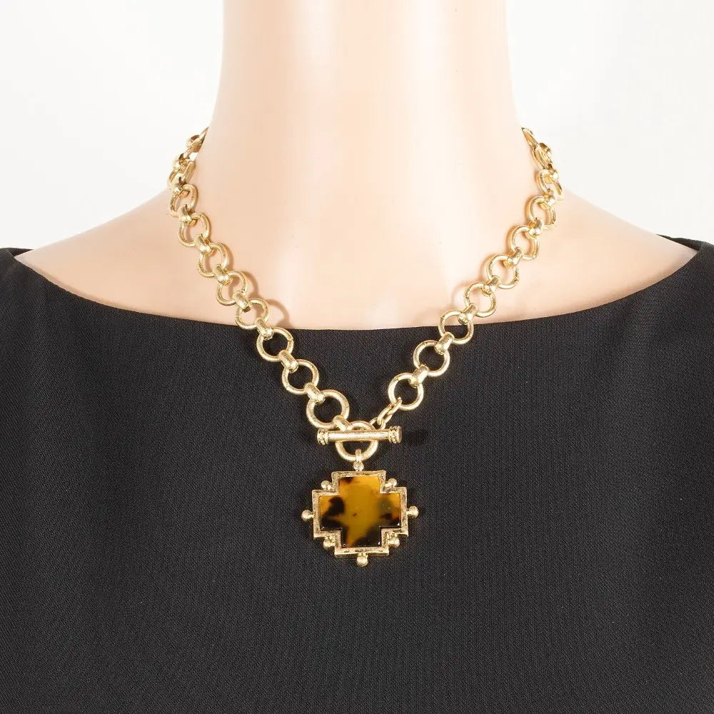 tortoise square cross toggle necklace