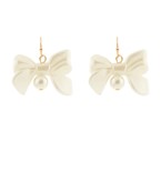 Opaque shell bow with pearl earring