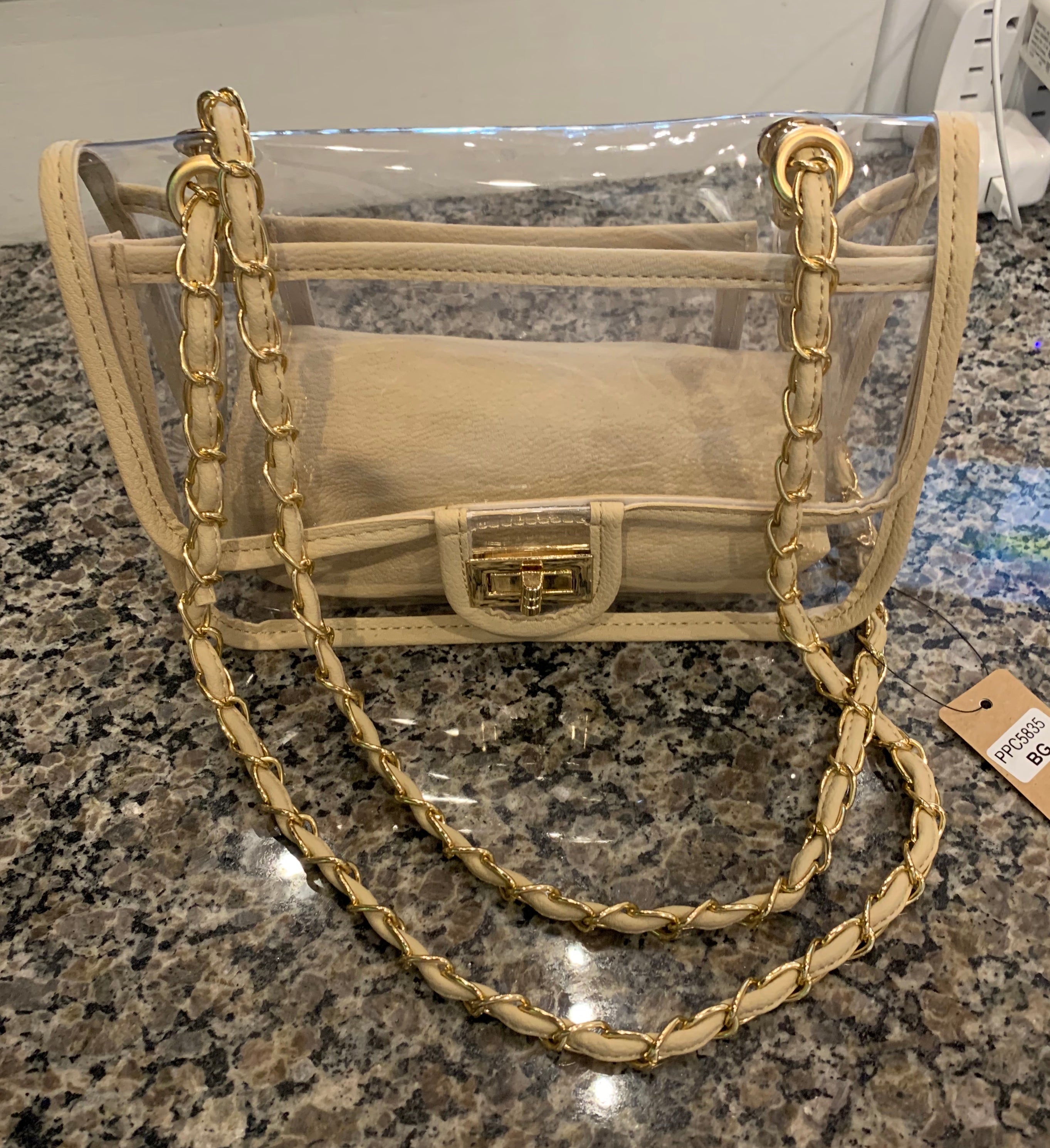 clear bag with gold chain