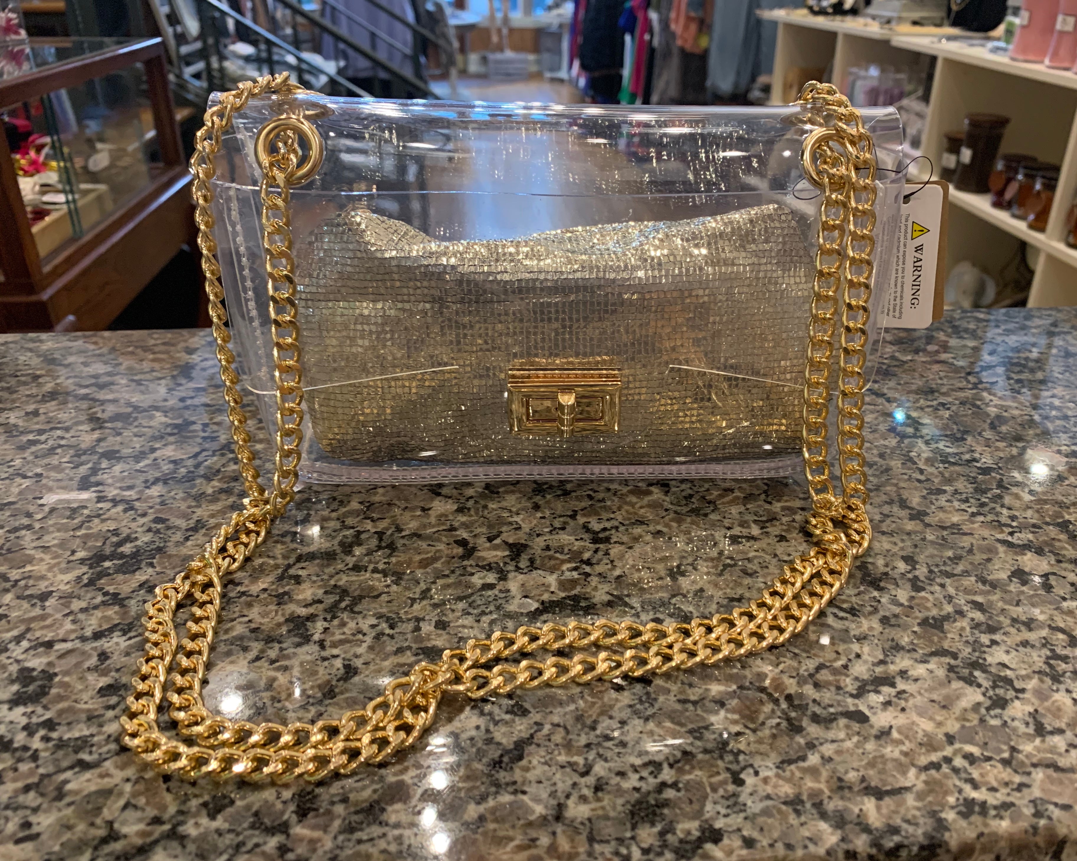 clear bag with gold accents