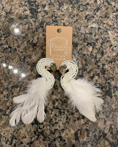 Feather tail Swans