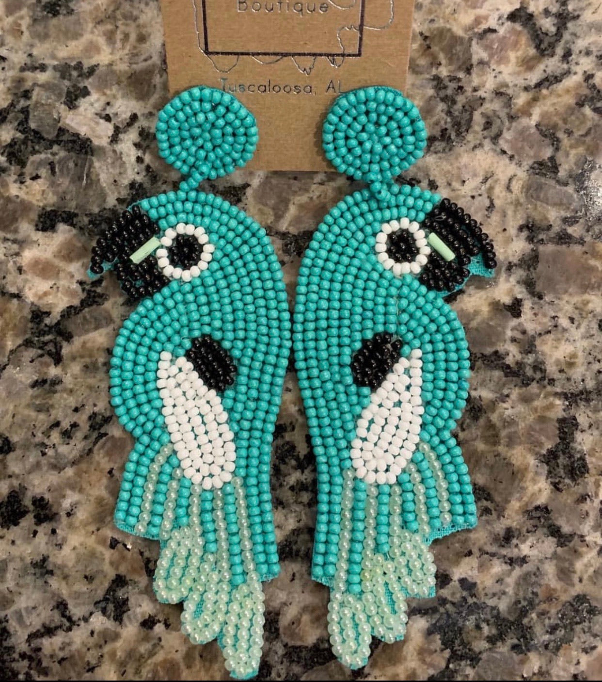 Turquoise beaded parakeet