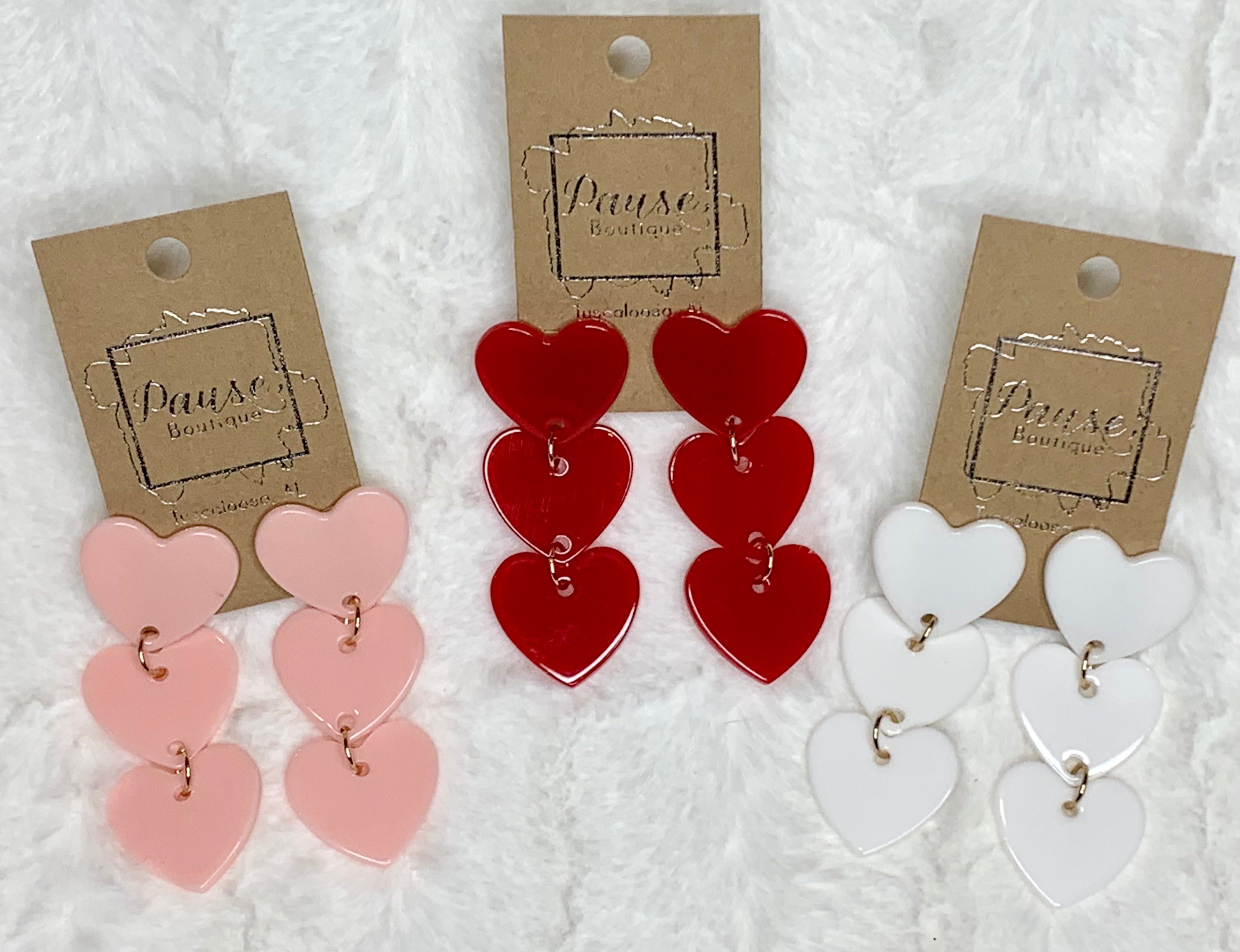 three heart drop earrings