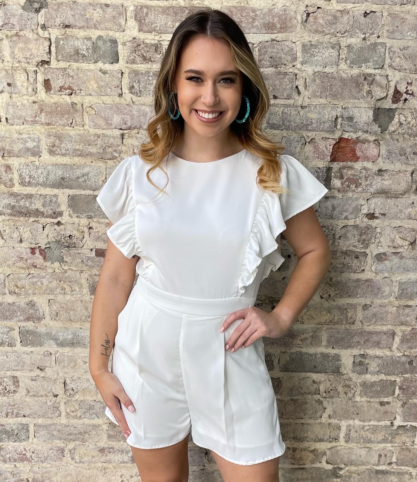 Ruffle romper with pockets