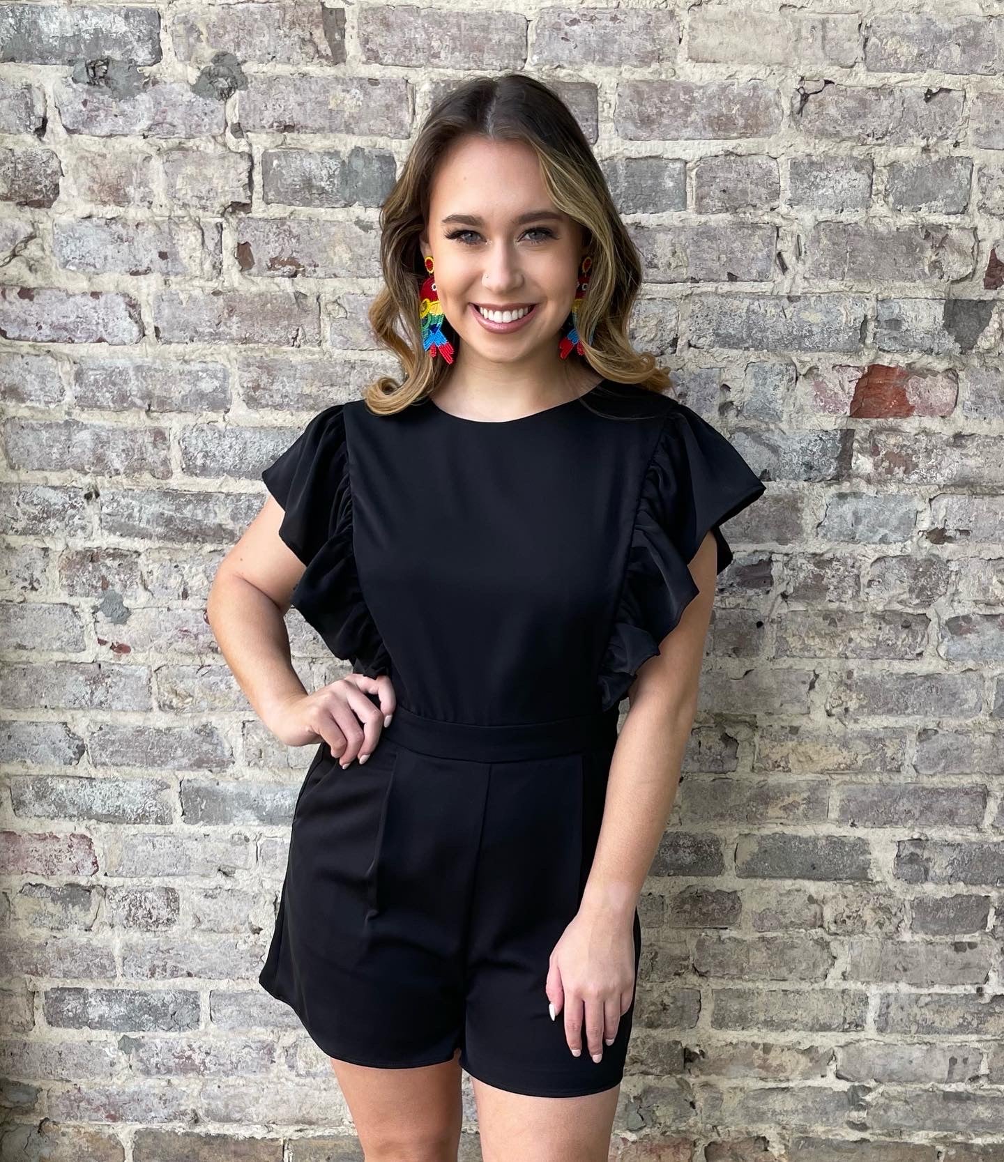 Ruffle romper with pockets